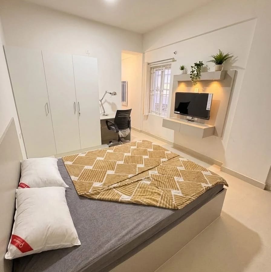 May be an image of bedroom and indoors