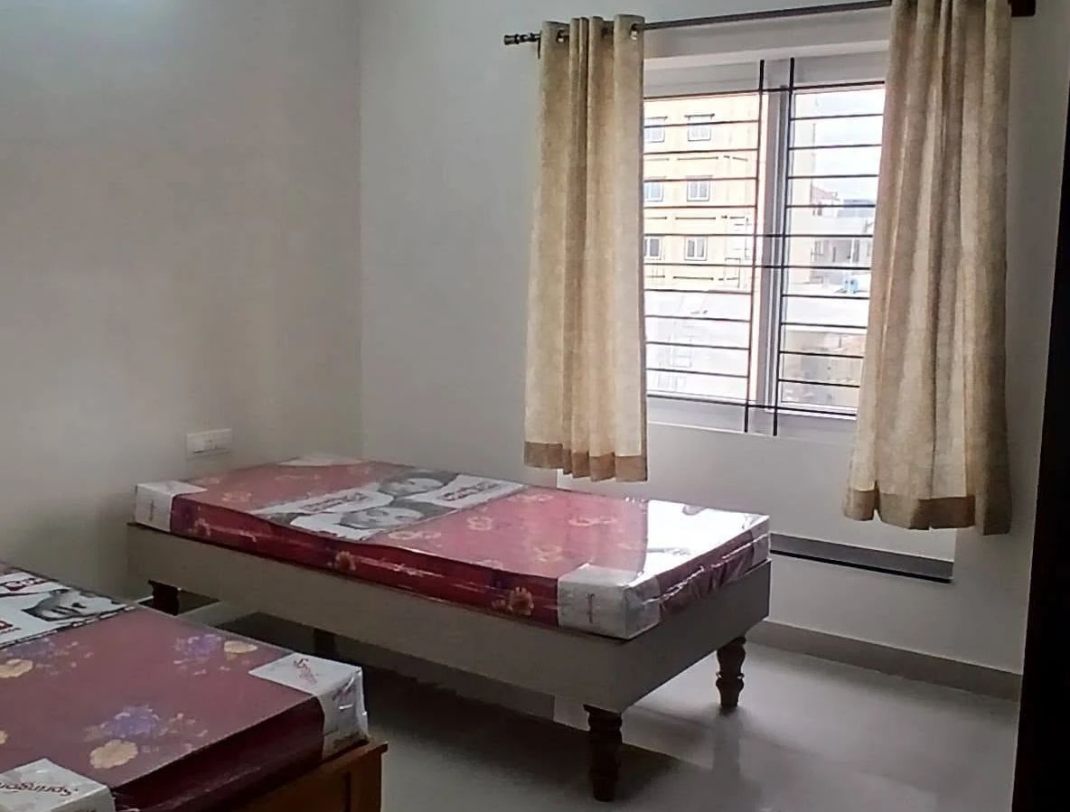 May be an image of mosquito net and bedroom